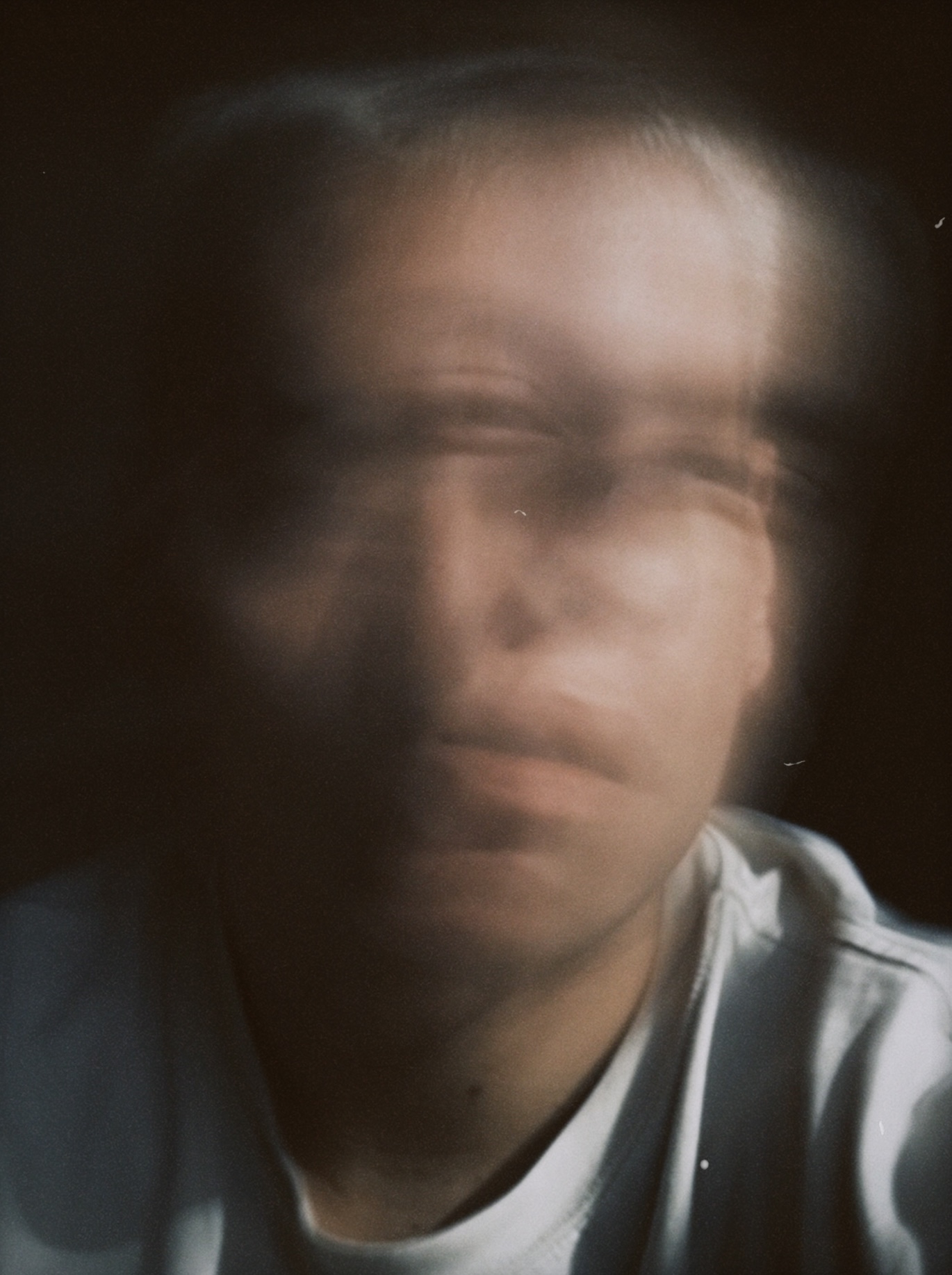 Film-inspired portrait photography from the album campaign.